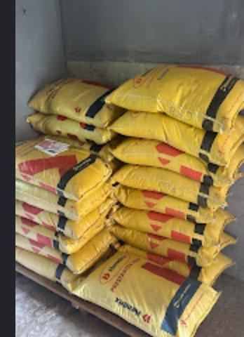 Stacked poultry feed bags at the Right Brodas feed store